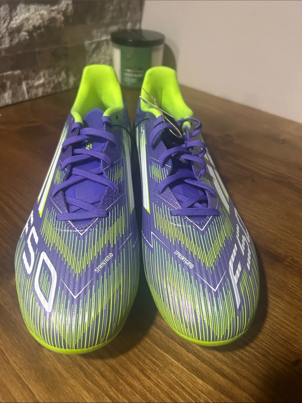 Adidas F50 League FG/MG soccer cleats purple/lucid lemon. Men’s 11.5 women 12.5